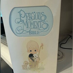 Soft back Precious Moments blue bible. New in box. Never used